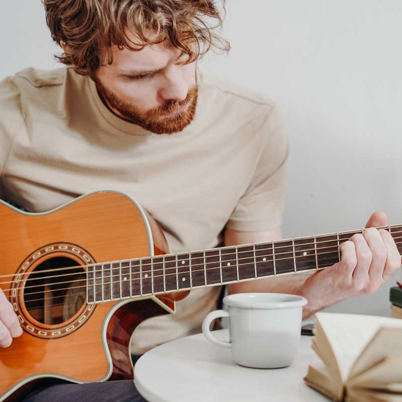 learning to play guitar as an adult in Santa Ana